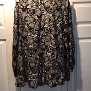 Long sleeve floral blouse.